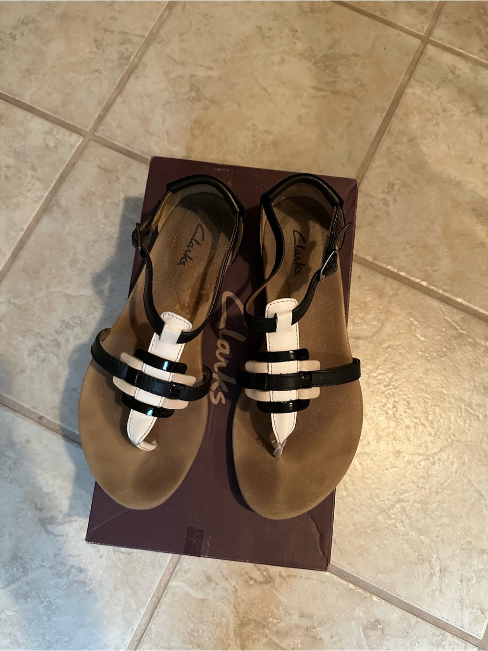 Clarks Women's Black and White T-Strap Sandals